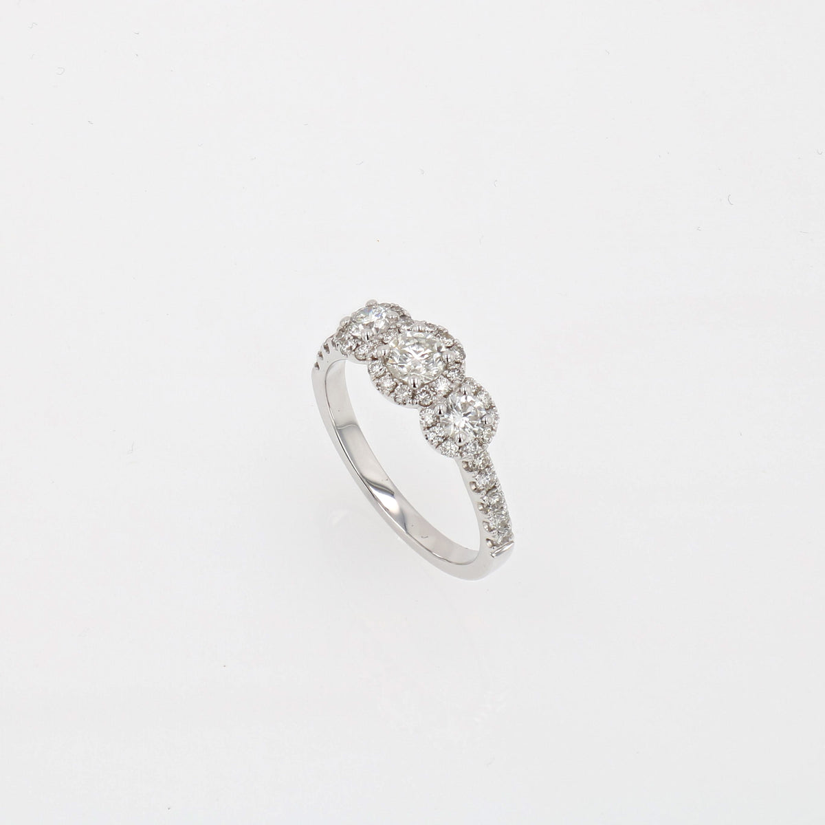 Three Stone Halo Complete Engagement Ring 1 01CTW three-stone-halo-complete-engagement-ring-1-01ctw