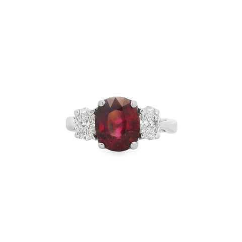 3.21CT Oval AGL Burma Ruby with .83CTW Diamond Three Stone Ring set in Platinum