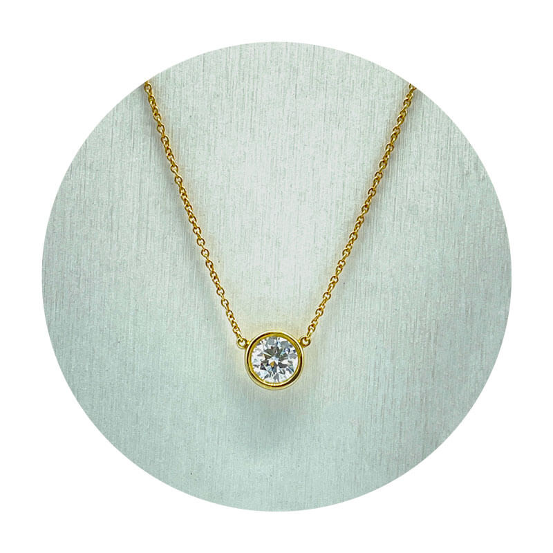 Estate 18K Yellow Gold Tiffany & Co. Solitaire Fixed Pendant on a chain (1.25CTW)