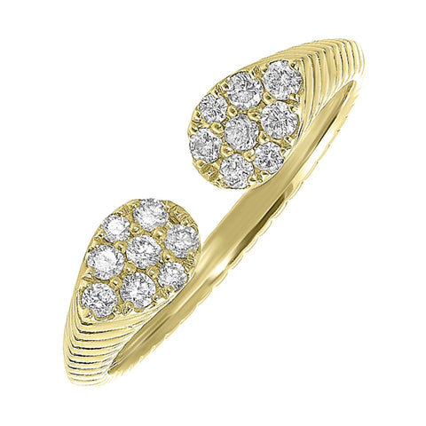 This exquisitely textured yellow gold ring is a royal masterpiece. Its band tapers towards two pear-shaped diamond clusters, converging to create a profile that captures the essence of regal charm.