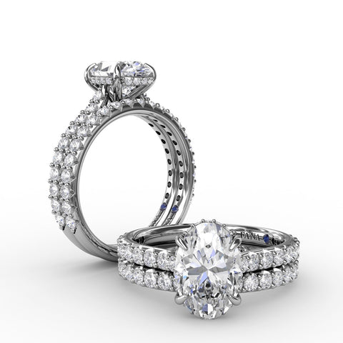 Classic Oval Diamond Solitaire Engagement Ring With Hidden Pavé Halo