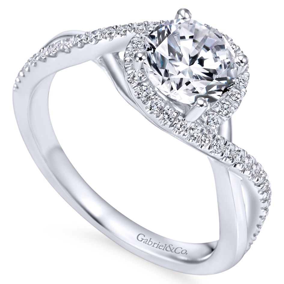 Criss cross sale halo engagement ring